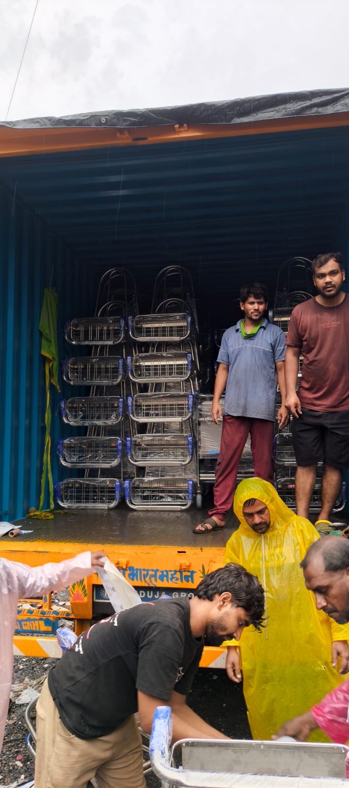 Airport baggage trolleys being loaded onto truck for pan-India delivery